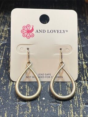 And Lovely Gold Teardrop Hoop Earrings